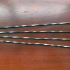 Hand-forged metal grill skewers