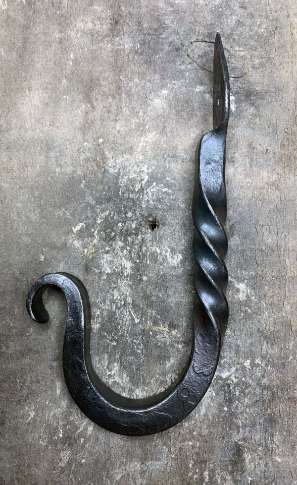 J hook with curled end and twist